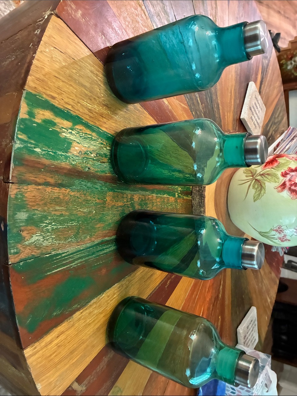 Set of two Teal Glass Bottles with Silver Tops